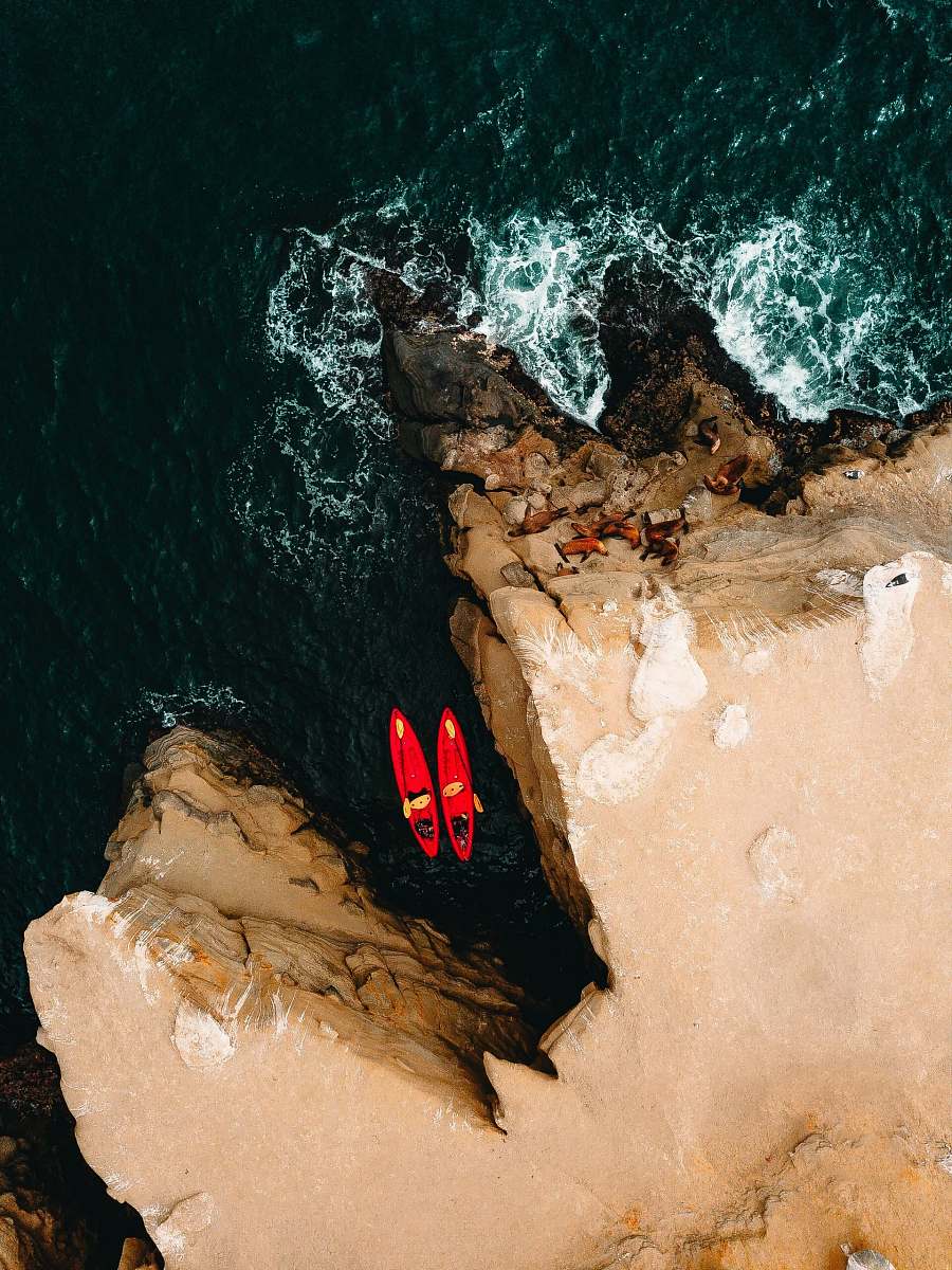 la jolla aerial photography of two red kayaks san diego